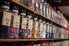 Jars Of Sweets In Sweet Shop - Rows and rows of glass jars full of sweets, in the sweet shop. Jars Of Sweets In Sweet Shop - Rows and rows of glass jars full of sweets, in the sweet shop.