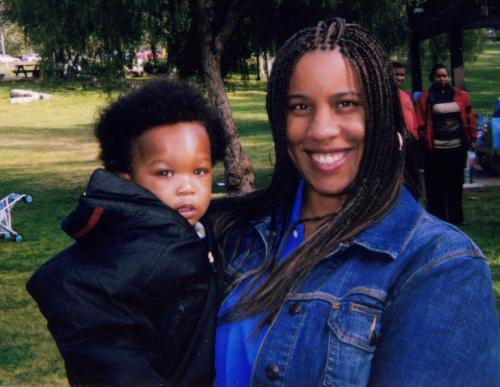 My Sister And Her Grandson - This is a picture of my sister and her grand baby. I took it at his first birthday party.