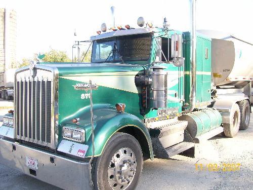 my truck - 1994 Kenworth W900B. 13 spd. 425 Cat. - Frameless dump trailer
