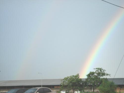 Double Rainbow - A picture I took one evening of a double rainbow. The one on the left can't be seen so much.