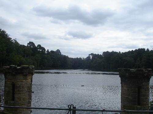 Buchan Country Park - Lake - The lake in Buchan Country Park, complete with turrets where water overflows, creating a waterfall down the stepped flowover.