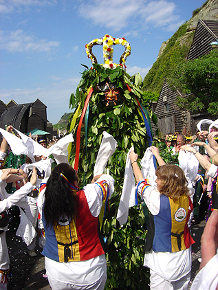 Jack In The Green With Morris Dancers - Jack in the Green at Hastings Castle surrounded by Morris Dancers.