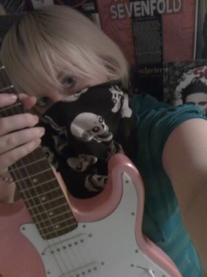 Zacky V. pt 2 - This is the second Zacky V. inspired picture I took. Only..this one is in front of my Avenged Sevenfold wall, kinda obsessed...and I have my guitar. Yay for pink guitars!!