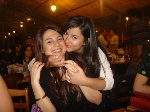 My sister and i  - i'm simply hugging my sister