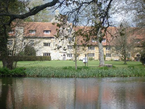 Michelham Priory Across Moat - Michelham Priory from the other side of the moat, which area is accessible by low, wooden bridge, across the water.