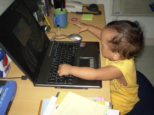 my bugoy on laptop - my bugoy using the laptop.. oh how i miss the laptop... huhuhuhu