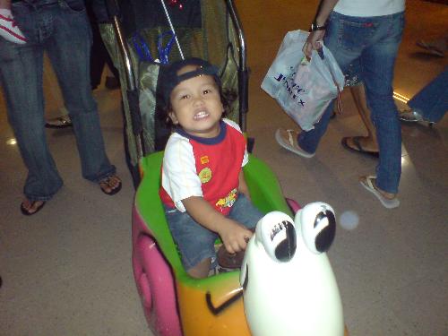 my bugoy - riding on a toy car doing a shopping at sm cebu. i got very tired at that day since my bugoy is sooooooo naughty.