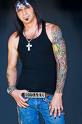 Michael Godard - This is Michael Godard.You should go to his website to see his work.