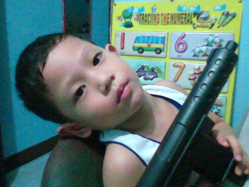 Wow! - he is so hundsome! heheheh.. that's my son!
