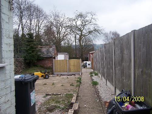 My back garden - This is a picture of my back garden, as you can see it is a mess at the minute, but when we have it done in June I am hoping it will be lovely.