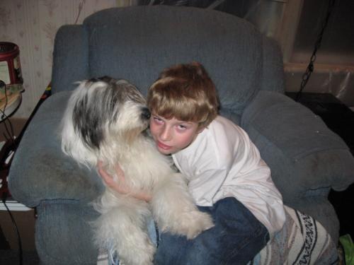 My son and his birthday present - my son gets a kiss from his birthday present