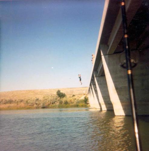 If someone asked you to jump off a Bridge, would y - YES, obviously so! Not the best Picture, but the DOT is me jumping off the Bridge at Snake River in Melba, Idaho, my favorite Fishing Hole. Did I do it again, HELL NO, that's a long way down, just had to try it once and it is also now against the Law. You can't bust me, the Statue of Limitation has run out...so there.