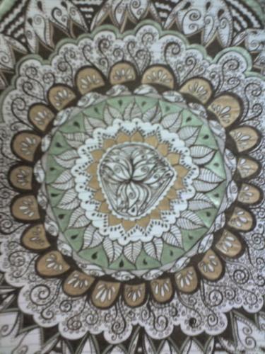 mandala - i used pen and ink with colored pencils