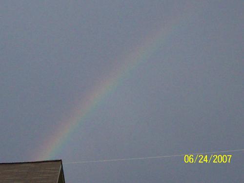 rainbow - This was taken right on my front step minutes before it disappeared. Guess I'll never find that pot of gold lol.