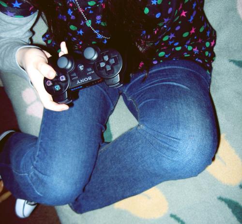 Playstation 3 Player - Girl playing playstation 3.