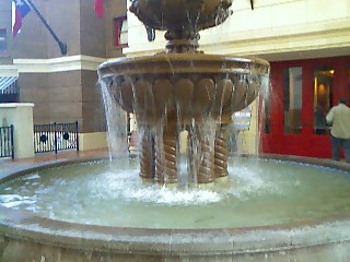 Water Fountain - Here is a picture that I took of a water fountain inside the Gaylord Texan Center. They have several like this one as well as a riverwalk and several nice restaurants. It is very beautiful inside this center.
