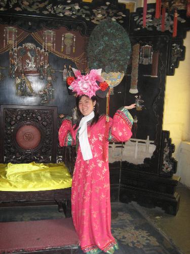 Born to be a princess! - I went to Summer palace with my mom this April and saw a place where They let us wear costumes and take pictures. It cost us 30RMB. I thought its fun to wear one and see how it would look. I think it turned out ok.. don't you think? Born to be a princess??:)