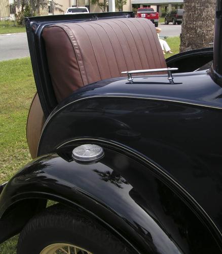 rumble seat - Cars in the 20&#039;s had "back seats" located where trunks are now. Anyone who rode in the rumble seat caught the wind, weather and exhaust from the car. They were popular, though. Photo taken at an antique car show.