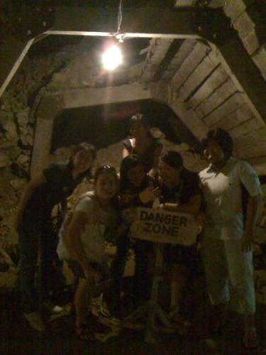 danger - having fun in the tunnel...  the danger zone sign is for real yet we still had our picture taken in the tunnel...haha,, daredevils..