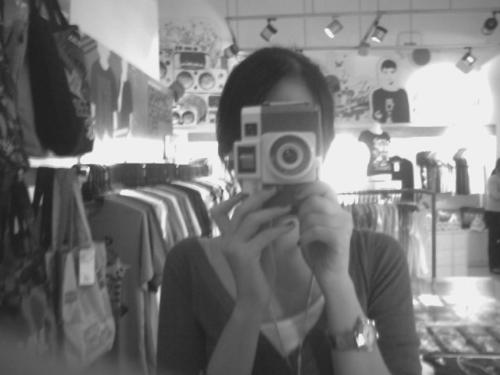 Me - This is me posing with a Holga camera. It's a really cool invention because it's old school and yet fun and exciting. Taking pictures and looking at them afterwards is one of my favorite things to do in the world. Although photos can only capture so much, leaving out important stuff such as emotions, actions, feeling, and words, I also believe that a picture can draw out memories.