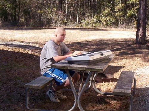 piano player - sisterjinx's 15 year old son taught himself to play piano.
