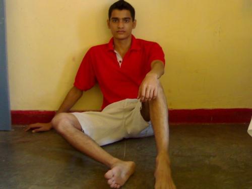 This is meehh... ha ha looking great!!! isn't it? - this photograph waz clicked by mee when came home after my coll. vacations started.. i am wearing a red coloured extra large t-shirt and a cream coloured large bermuda......