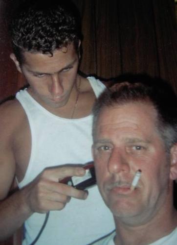 hair cut - My late husband, getting a haircut from his youngest son.