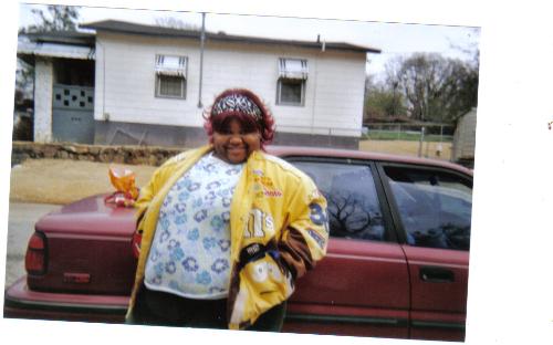 Me at home - This is a photo of me in front of my house (thats not the one behind the car)