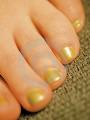 Painted Toenails - golden painted toenails