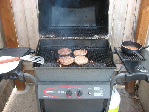 bbq - Char broiled burgers and baked beans bbq - Char broiled burgers and baked beans
