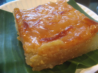 a slice of cassava cake - Native snack in the Philippines. Usually eaten during afternoon snacks or for dessert. One of the many kakanins in the Philippines.