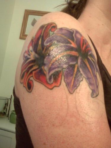 here's the lillies with color - can't wait till th - work in progress! but they are coming to life now. the old tattoo is almost gone!