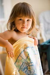 Girl with blanket - a girl wrapping herself in a blanket. i think she's cute :)