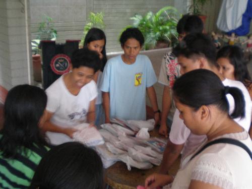 Helping Others - Free school supplies given to indigent children.