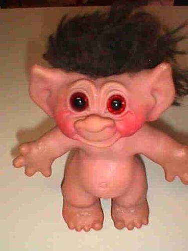 A cute troll - Remember collecting trolls in the 80s and 90s? They came in all sorts of sizes, hair color and occupations. Mostly they came naked though, like this cute little fellow. I've always wondered though--how could they reproduce with NOTHING down there?