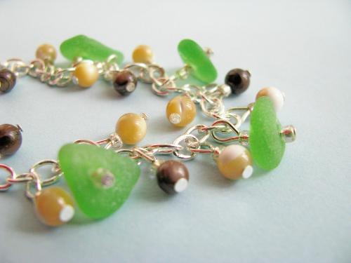 Green Sea Glass Bracelet - Five pieces of authentic green beach glass adorn this 7 1/2' sterling silver bracelet.