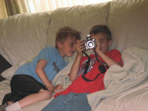 Smile Grandpa! - They love taking pictures with their mom's camera. Smile Grandpa! - They love taking pictures with their mom's camera.