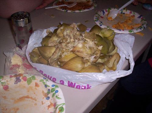 After the artichoke is gone.... - All that's left is husks and inedible junk, looks real bad, doesn't it? But it sure tasted good!! 
