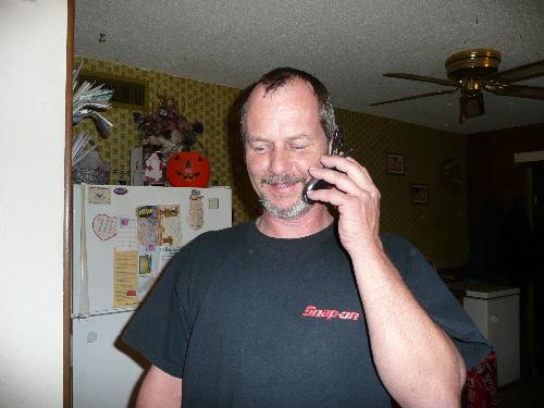 My youngest son - SOn on phne like always helping someone long distance