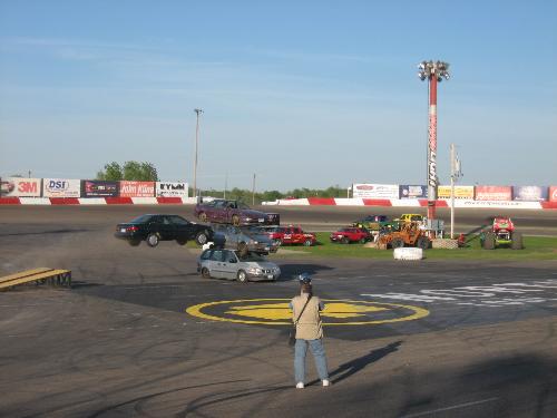 Split timing shot - Just before he hit the stack of cars. What a great timed shot for a small digital camera. Split timing shot - Just before he hit the stack of cars. What a great timed shot for a small digital camera.