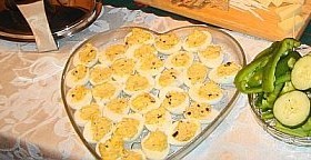 Deviled eggs - Deviled eggs appetizer served in a heart-shaped glass plate/tray during the holidays.