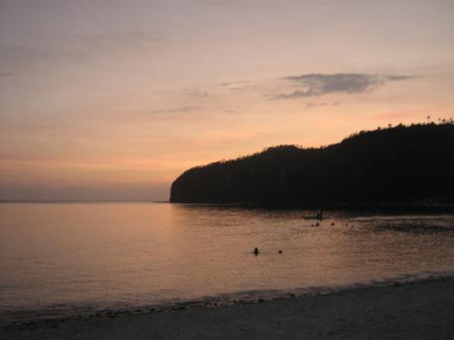 tingloy at sunset - crimson horizon enveloping us..