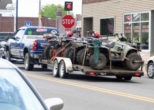 Truck towing 4 ATV's - Taken Memorial Day weekend. This was on of many vehicles that were towing alarge recational vehicle. Truck towing 4 ATV's - Taken Memorial Day weekend. This was on of many vehicles that were towing alarge recational vehicle.