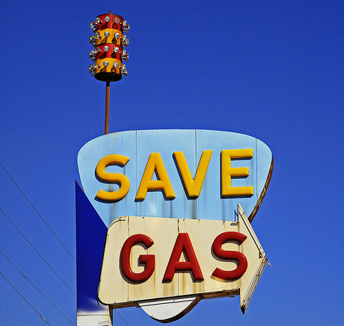 save gas - a sign telling people to save gas