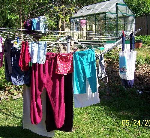 A use for a totebag - Here is my laundry hanging out in beautiful Joppa, Maryland. I needed a clothespin bag and didn't want to spend any money.