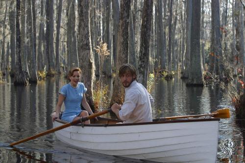 the notebook - swan scene - this is a photoshot from the movie the notebook taken from the scene in which the couple is rowing between the swans..