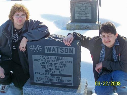 my kids  - visiting their fathers and grandmas grave a couple months ago