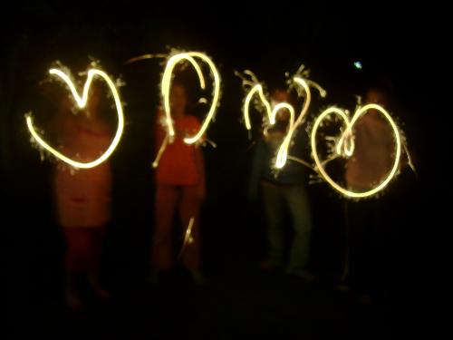 My daughter on the far left  - I love these pics of my daughter and her friends with their sparklers. It is so cool that I was able to capture what they were making.