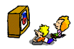 Kids in front of TV - Two kids sitting on floor in front of television.