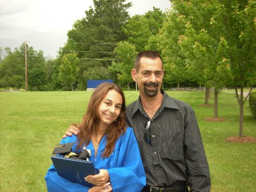 daddy - this is a picture of me and my biological father at my high school graduation. I Love you daddy